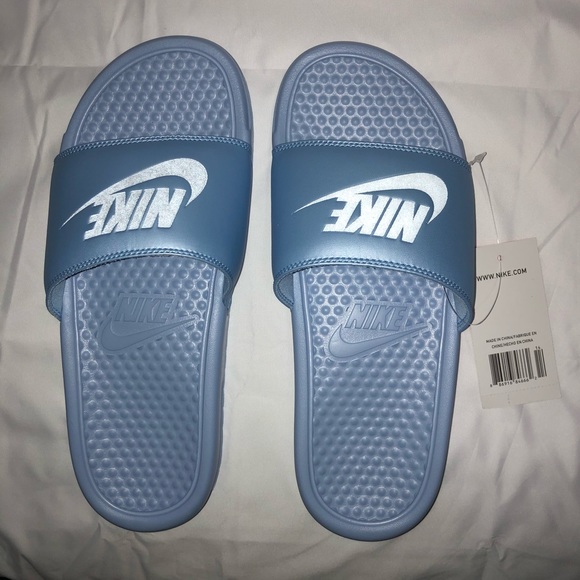 light blue nike slides